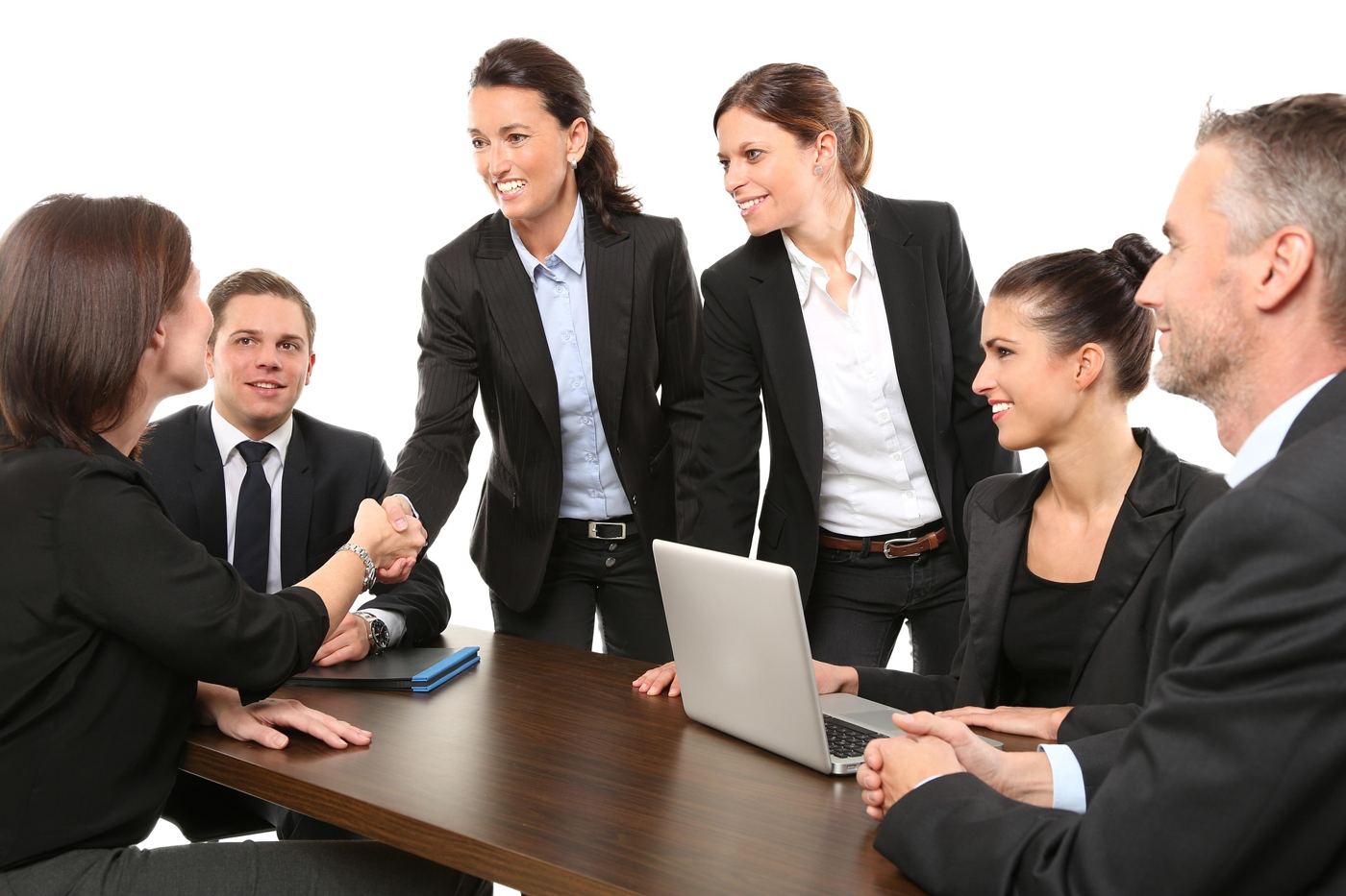 People meeting around a table to talk through a case